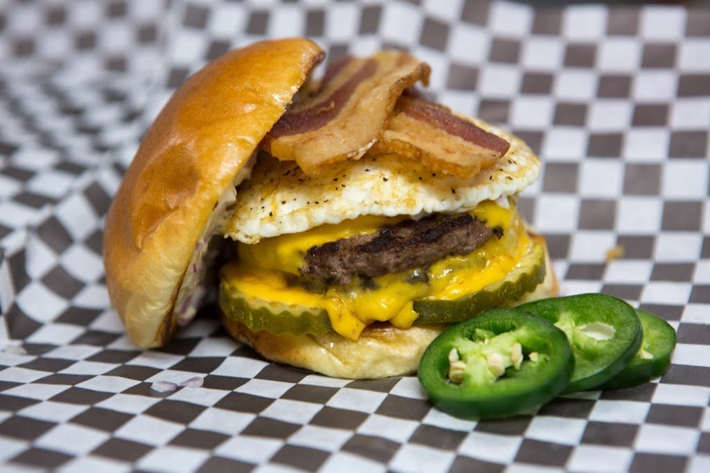 Big Ange's Signature Cheese Burger (w/extras: fried egg, bacon & jalapenos)